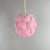 3D printed Apo Malli lampshade in modern design in sakura pink biodegradable material.