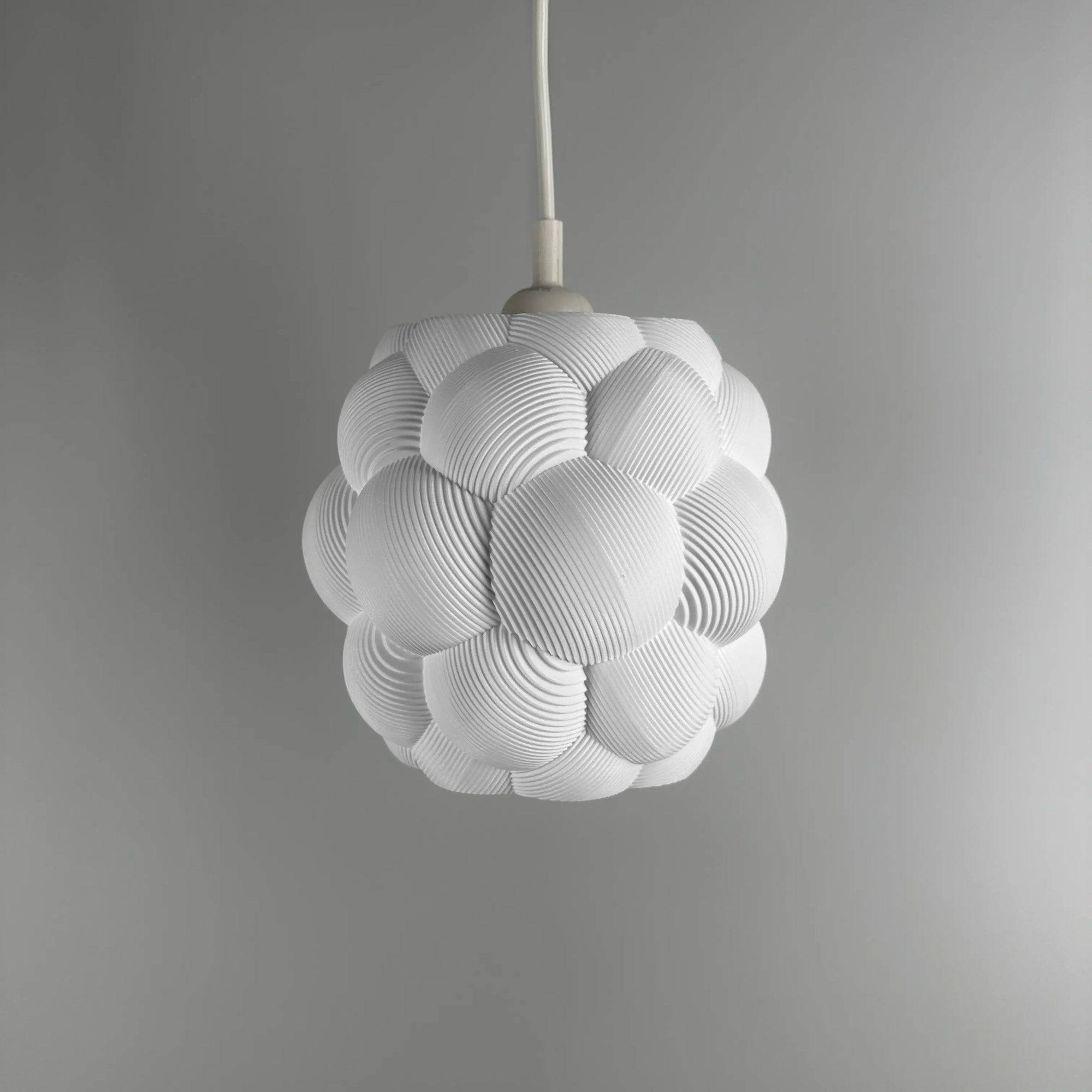 3D printed Apo Malli lampshade in modern design in cotton white biodegradable material.