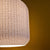 "Side view of a Lucash lampshade, focusing on the seamless blend of innovative design and sustainable materials.