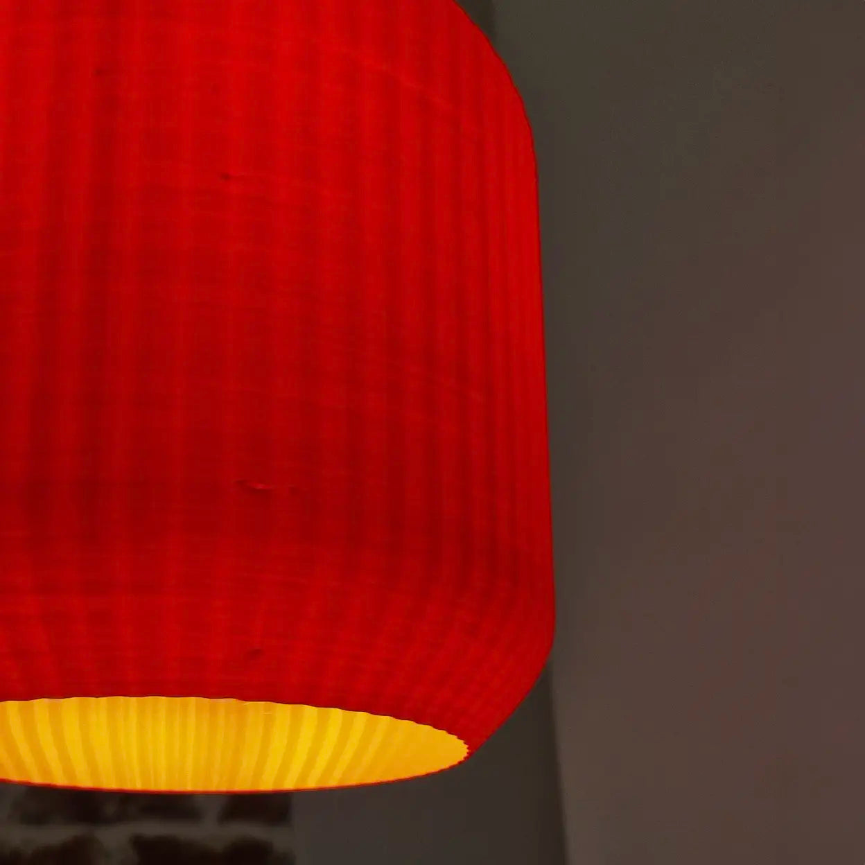 Close-up view of Lucash lampshade highlighting the detailed texture when turned on.