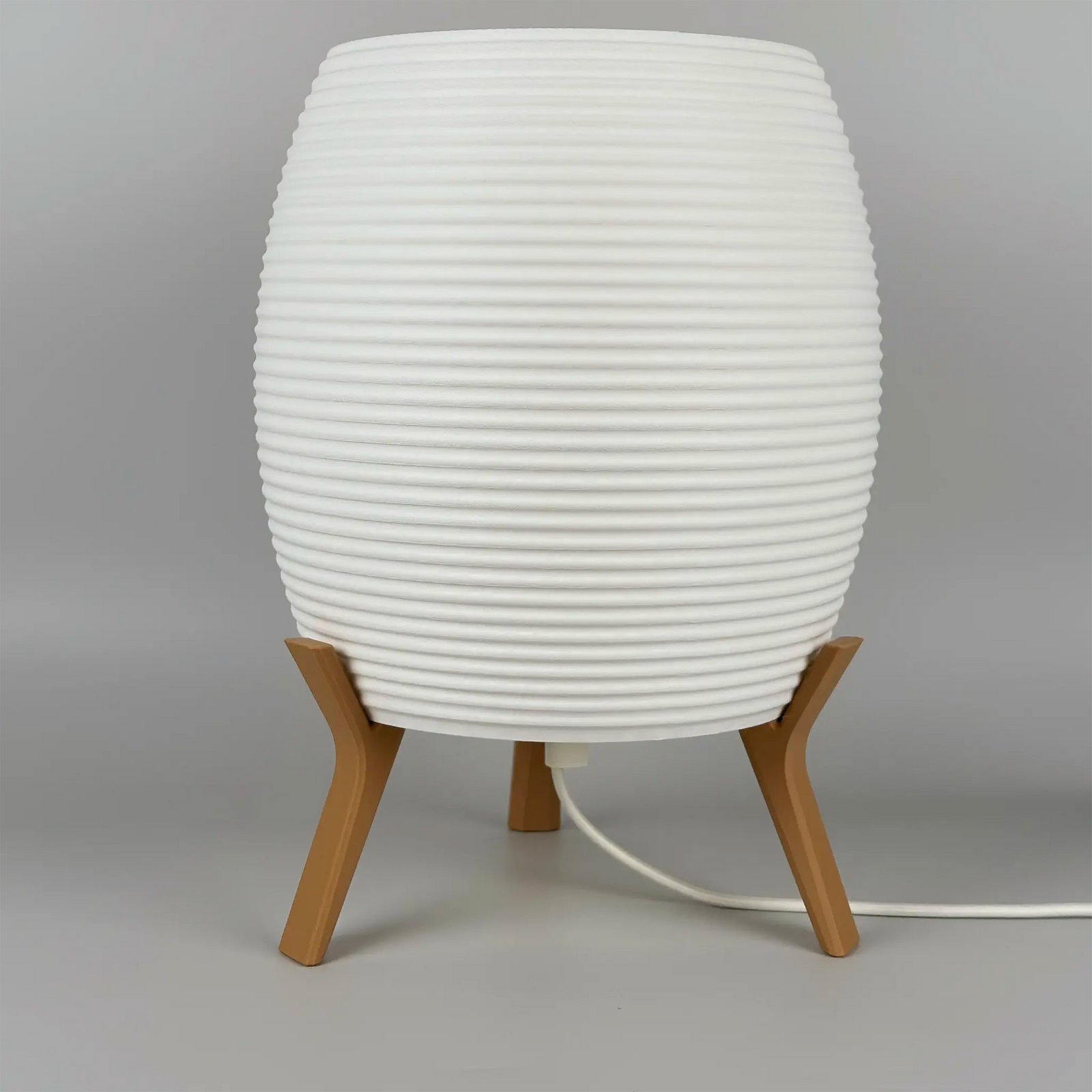 MinimalElegance Curve Table Lamp - Minimalist Bedside lamp in cotton white shade and wood brown base. Lamp is turned off.