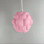 3D printed Apo Malli lampshade in modern design in sakura pink biodegradable material. Used with 400k LED bulb on and off