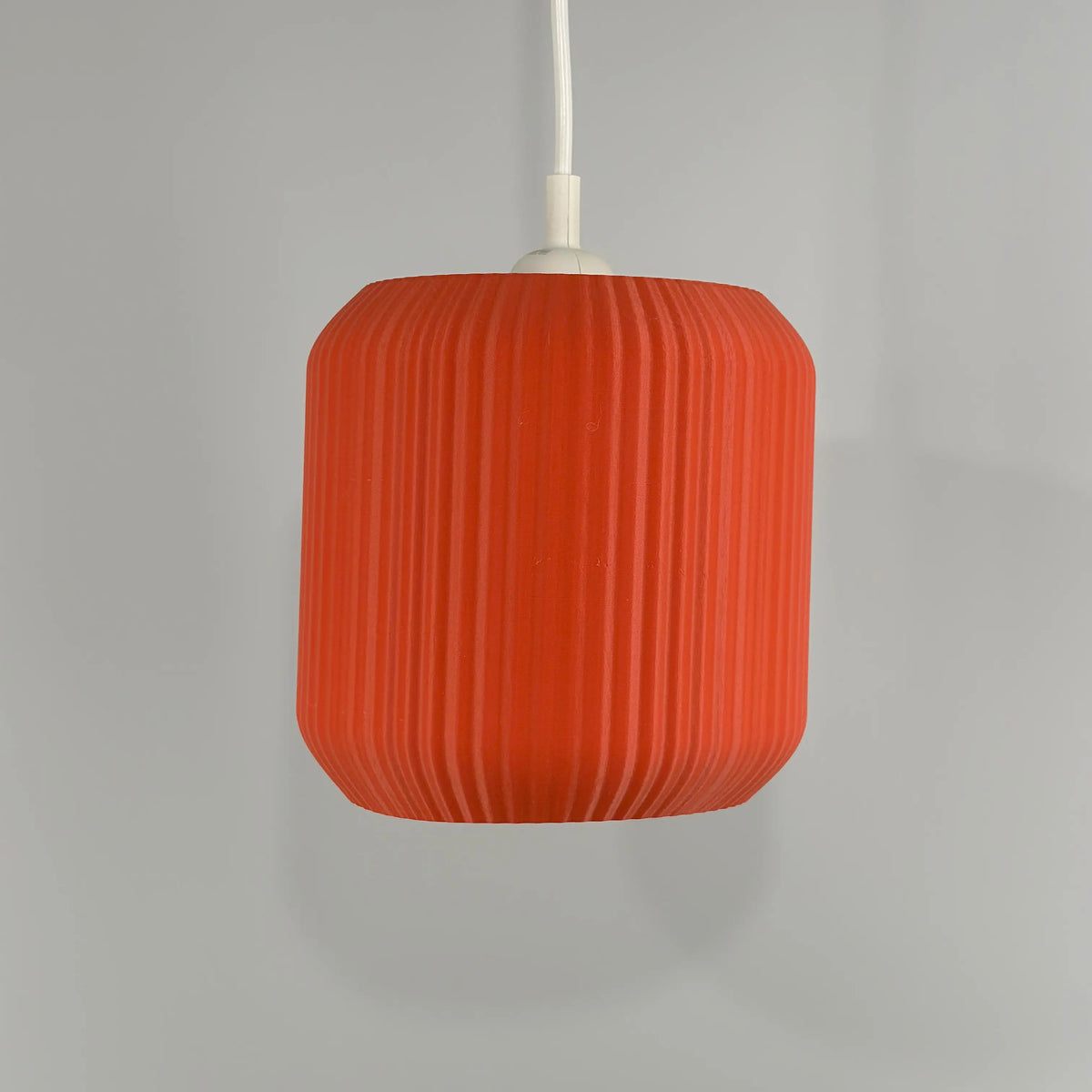 Assortment of Lucash lampshades in various colors, demonstrating customization options for personal style.